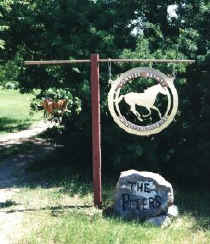 SIGN AT DRIVEWAY ENTRANCE